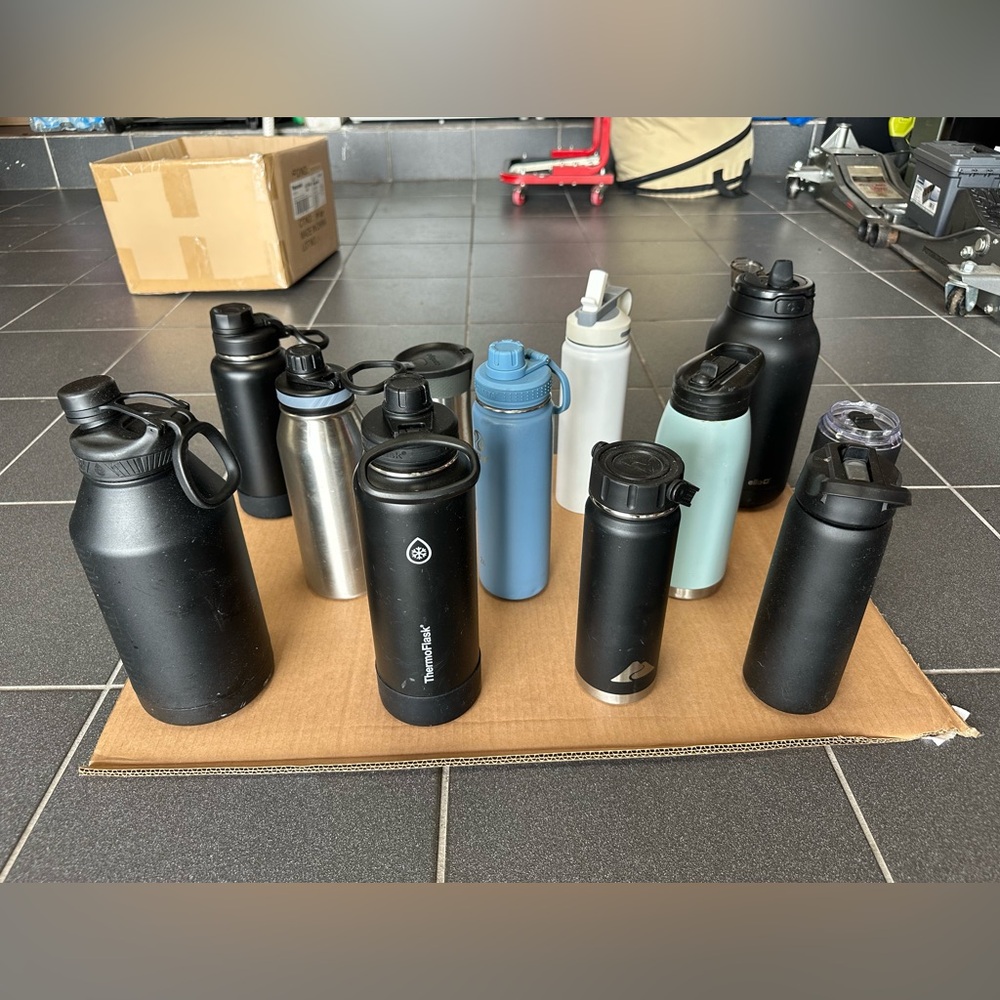 Set of 12 Tumblers assorted colors, sizes and brands all Preowned .